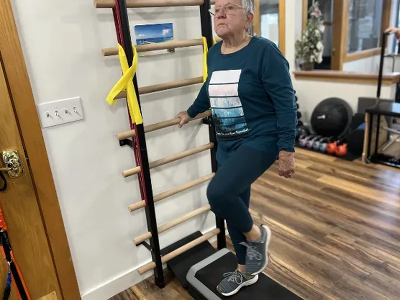 Doctor of Physical Therapy working one on one with a patient