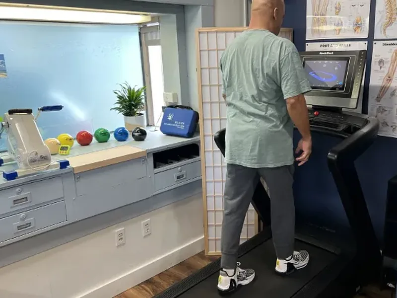 Doctor of Physical Therapy working one on one with a patient