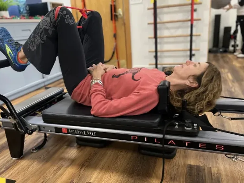Doctor of Physical Therapy working one on one with a patient