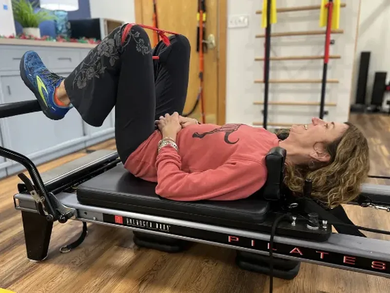 Doctor of Physical Therapy working one on one with a patient