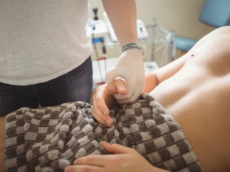 Doctor of Physical Therapy working one on one with a patient
